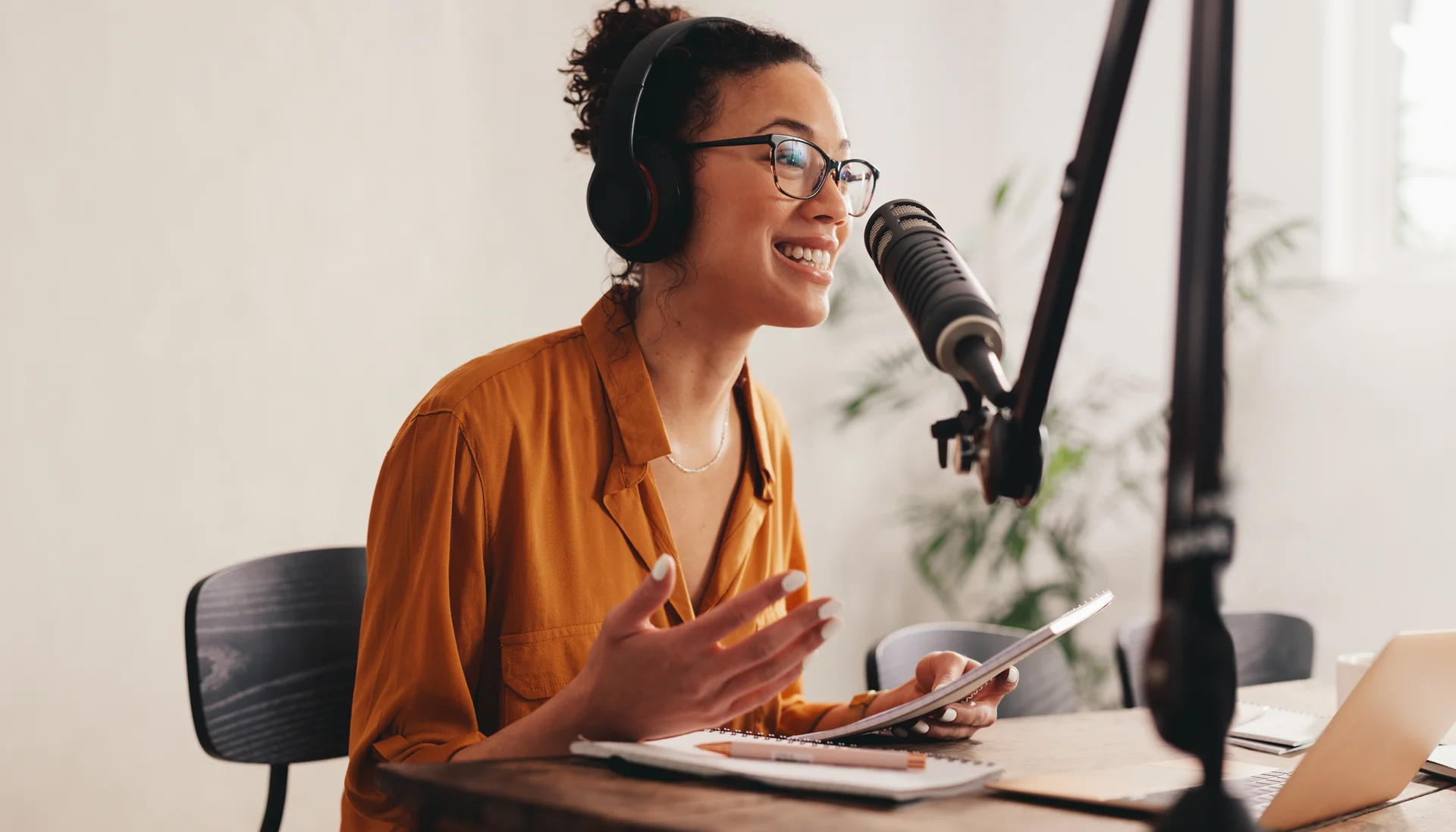 Woman speaking on a podcast