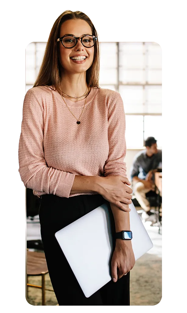 Woman holding laptop